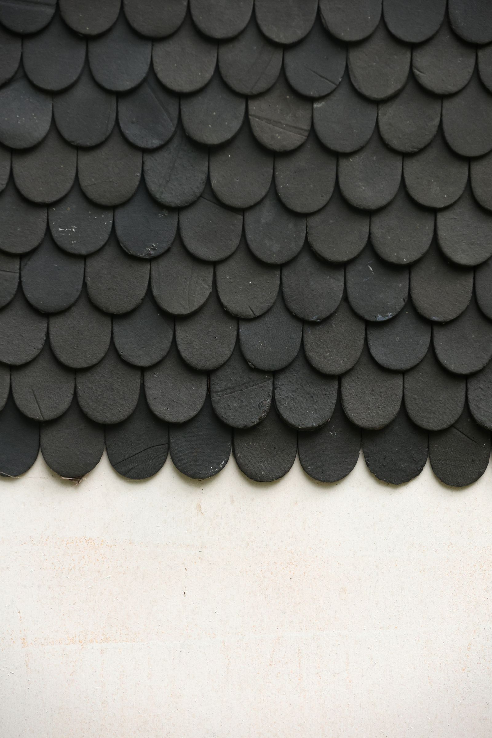 Worn shingles on an ageing roof