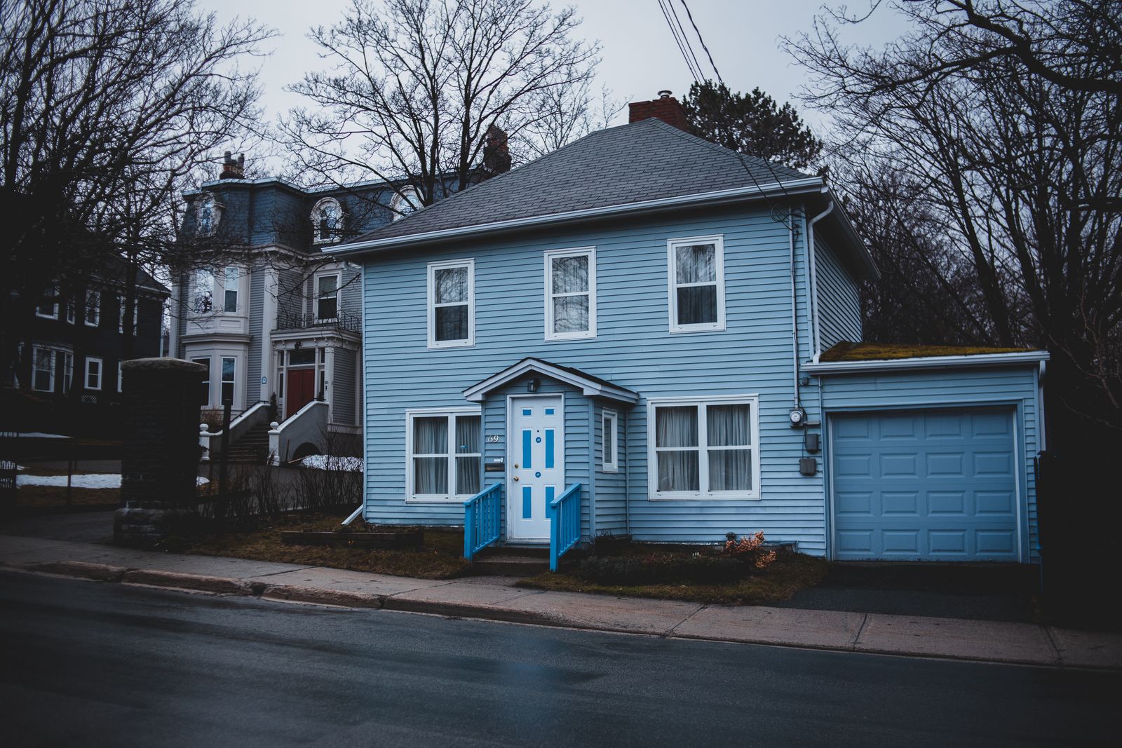 Siding being installed on a house exterior